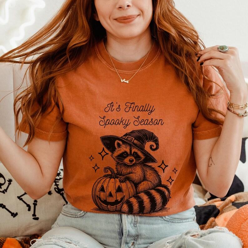 Finally Spooky Season Raccoon Halloween Shirt.
