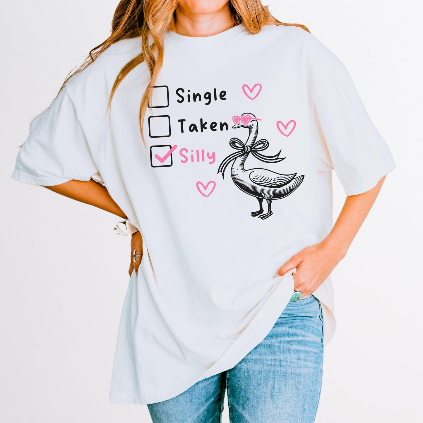 Silly Goose Valentine's Day Shirt - Just Goofy Little Guys  T-Shirt Forget romance—it’s all about embracing your silly side this Valentine’s Day! Our “Single, Taken, Silly” tee features a playful design with checkboxes and the “silly” box proudly checked. Perfect for the goofy, fun-loving folks who prefer laughs over love songs. Made with soft Comfort Colors cotton, this unisex shirt is ideal for Valentine’s Day celebrations, Galentine’s hangouts, or just showing off your silly goose vibes all year round. 